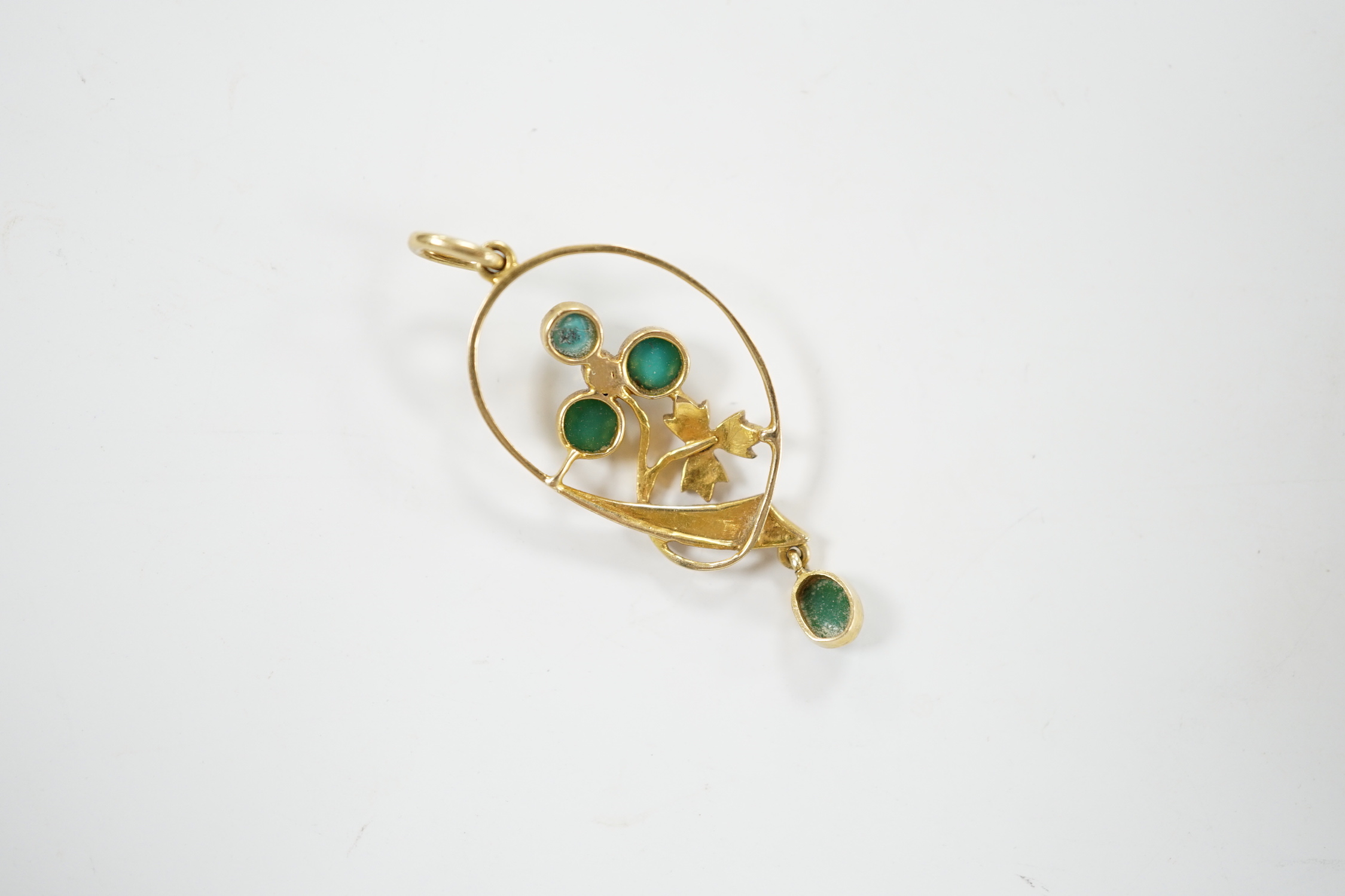 An Edwardian yellow metal (tests as 15ct) turquoise and seed pearl cluster set drop pendant, overall 39mm, gross weight 2.6 grams.